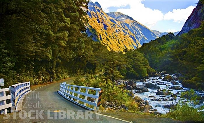 Road to Milford Sound;Fiordland;mountains;hills;rivers;Road;State Highway 94;bush;native forrest;green fields;green paddocks;lakes;blue sky;Holyford River;bridge