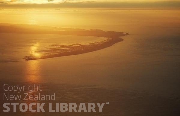 Aerial;Farewell Spit;Golden Bay;hills;rivers;Road;bush;native forrest;golden sands;sand dunes;lighthouse;scrub;blue sky;blue sea;dune grass;bluffs;cliffs;rocks;caves;arches;Four wheel drive;sandy beaches;at sunset