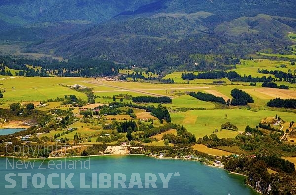 Aerial;Takaka;Golden Bay;hills;rivers;Road;bush;native forrest;green fields;green paddocks;lakes;blue sky;cattle;agriculture;dairy farming;state highway 60;Takaka Airfield;Takaka;Airfield