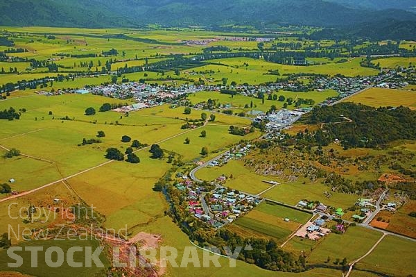 Aerial;Takaka;Golden Bay;hills;rivers;Road;bush;native forrest;green fields;green paddocks;lakes;blue sky;cattle;agriculture;dairy farming;state highway 60;Takaka River;Fonterra Dairy Factory