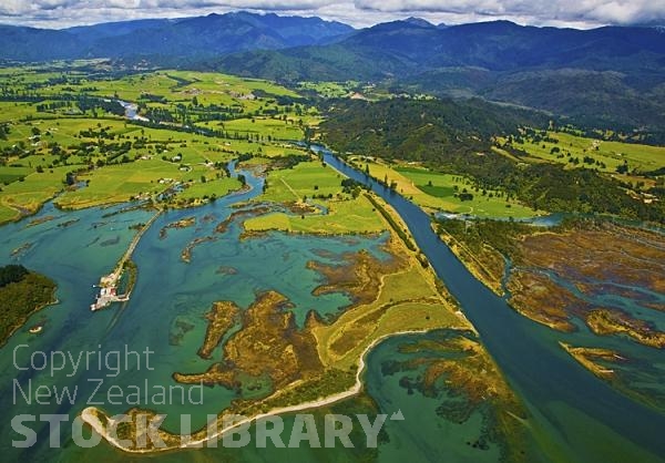 Aerial;Takaka;Golden Bay;hills;rivers;Road;bush;native forrest;green fields;green paddocks;lakes;blue sky;cattle;agriculture;dairy farming;state highway 60;Takaka River;Waitapu Wharf