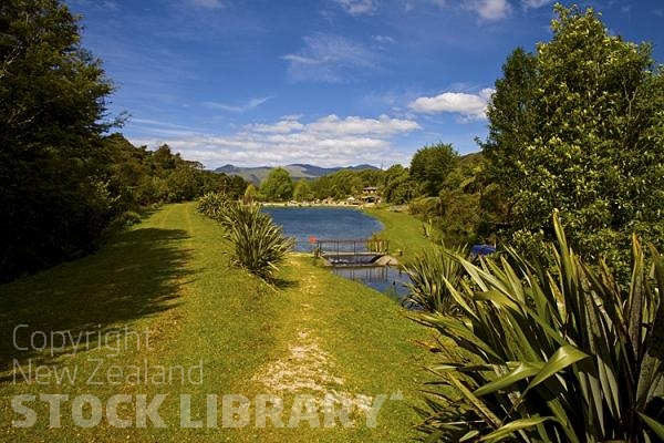 Takaka;Golden Bay;Anatoki Salmon Farm;hills;rivers;Road;bush;native forrest;green fields;green paddocks;lakes;blue sky;cattle;agriculture;dairy farming;state highway 60;Takaka River;Fishing lake;Fishing;lake