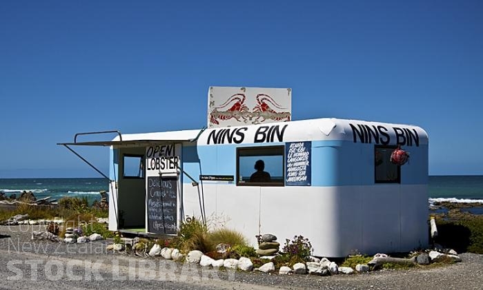 Kaikoura Coast;Kaikoura;bush;native forest;seaward Kaikoura Range;green fields;paddocks;brown hills;hills;mountains;rivers;ocean;pacific ocean;coast road;road;rail line;rocky shoreline;sea;Lobster Cart;Lobster seller;Cray seller;crayfish