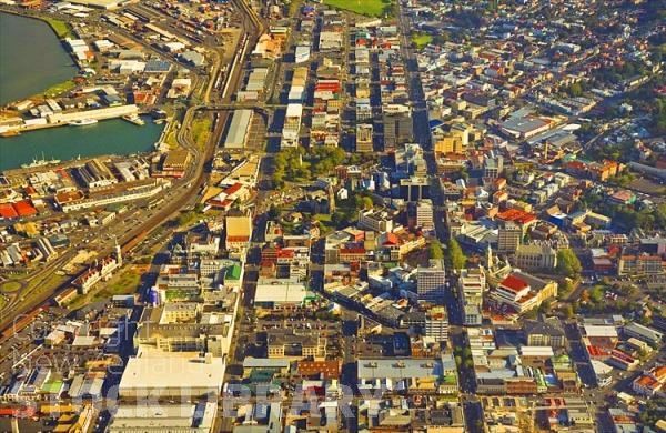 Aerial;Dunedin;Otago Peninsula;Otago;university city;university;harbour;golden sands;gothic buildings;Heritage Museum;law courts;Station;Train Station;The Octagon;church;churches