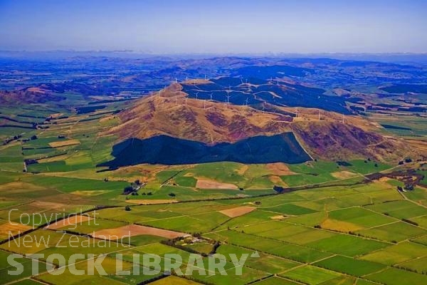 Aerial;Gore to Te Anau;Southland;mountains;hills;rivers;Road;bush;native forrest;state highway94;Dairy farm;dairy farming;green fields;green paddocks;bluffs;cliffs;River;Oreti river;sheep farming;Wind Power;Mossburn;wind farm;Wind Power;wind turbines