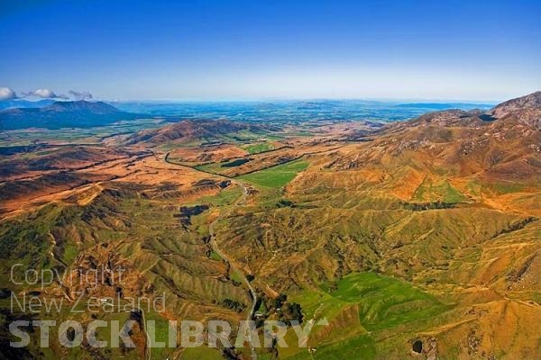 Aerial;Gore to Te Anau;Southland;mountains;hills;rivers;Road;bush;native forrest;state highway94;Dairy farm;dairy farming;green fields;green paddocks;bluffs;cliffs;River;Oreti river;sheep farming;The Gorge;The Key;West Dome