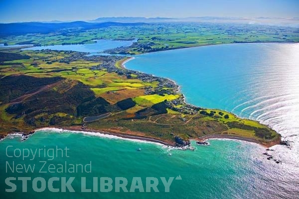 Aerial;Riverton;Southland;hills;rivers;state highway99;Dairy farm;dairy farming;green fields;green paddocks;Aparima river;sheep farming;sheep;Harbour;Baches;Cribs;Howell's Point