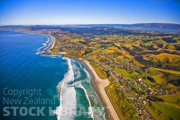 Aerial;The Catlins;Southland;hills;rivers;Road;bush;native forrest;green fields;green paddocks;bluffs;cliffs;River;sheep farming;Brighton