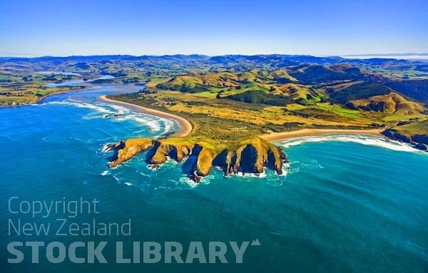 Aerial;The Catlins;Southland;hills;rivers;Road;bush;native forrest;green fields;green paddocks;bluffs;cliffs;River;sheep farming;False Islet;Canibal Bay;Surat Bay