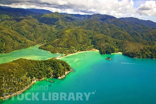 Aerial;Able Tasman National Park;Tasman Bay;sand dunes;sandy beaches;rocky shorelines;beach;beach front;bluffs;cliffs;boating;bush;native forrest;golden sands;Able Tasman National Park;Anchorage Bay;Baches;beach;beach front;boating;Boats at anchor