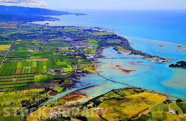 Aerial;Motueka;Moutere;Mapua;Tasman Bay;sandy beaches;beach;beach front;boating;golden sands;inlet waters;inlets;lagoons;coastal road;harbour;Motueka River;airfield;airport;fruit growing;vineyards;meatworks