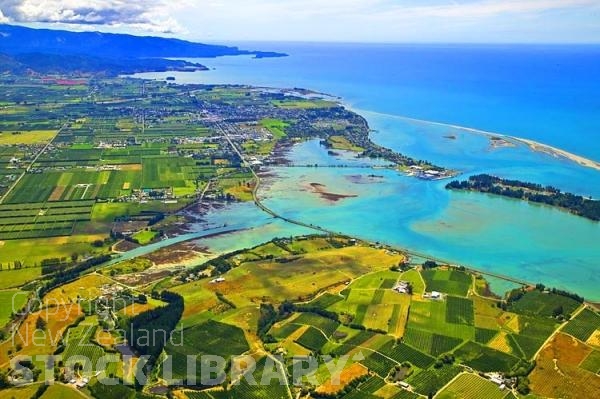 Aerial;Motueka;Moutere;Mapua;Tasman Bay;sandy beaches;beach;beach front;boating;golden sands;inlet waters;inlets;lagoons;coastal road;harbour;Motueka River;airfield;airport;fruit growing;vineyards;meatworks;Moutere Inlet